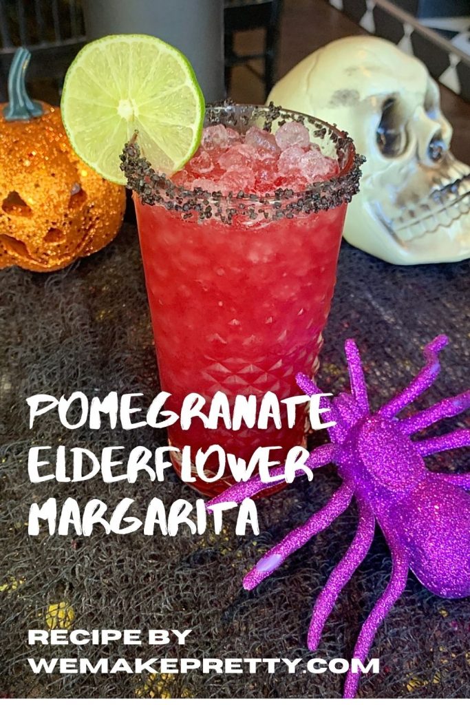 Pomegranate Elderflower Margarita Pinterest Image with Halloween Props